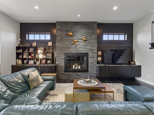 60 Windermere Drive, Edmonton, AB - Indoor Photo Showing Living Room With Fireplace