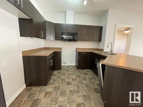 135 263 Macewan Road, Edmonton, AB - Indoor Photo Showing Kitchen With Double Sink