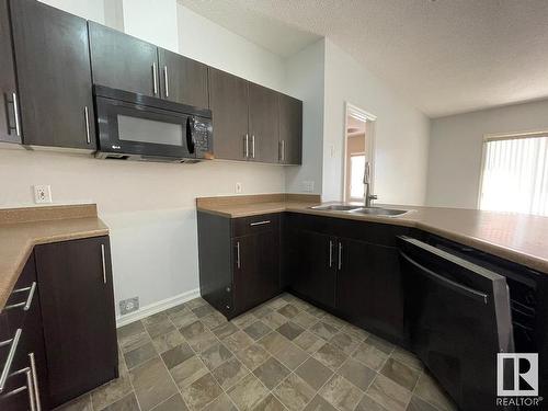 135 263 Macewan Road, Edmonton, AB - Indoor Photo Showing Kitchen With Double Sink