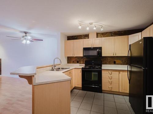 323 4312 139 Avenue, Edmonton, AB - Indoor Photo Showing Kitchen With Double Sink