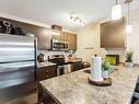 409 3353 16A Avenue, Edmonton, AB  - Indoor Photo Showing Kitchen With Stainless Steel Kitchen With Upgraded Kitchen 