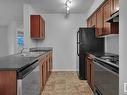 #109 5390 Chappelle Rd, Edmonton, AB  - Indoor Photo Showing Kitchen With Double Sink 