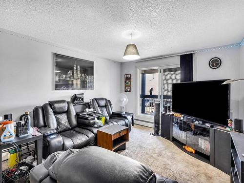 211 2624 Mill Woods Road E, Edmonton, AB - Indoor Photo Showing Living Room