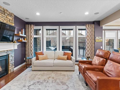 2205 Warry Loop, Edmonton, AB - Indoor Photo Showing Living Room With Fireplace