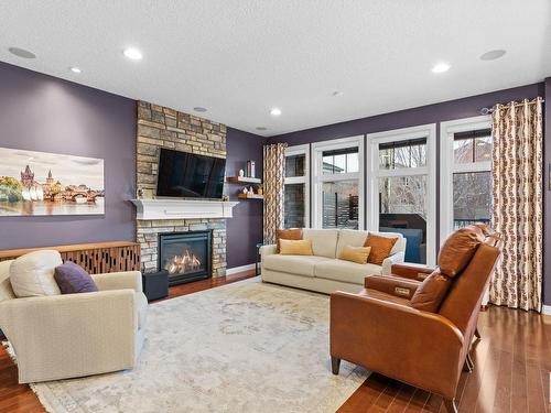 2205 Warry Loop, Edmonton, AB - Indoor Photo Showing Living Room With Fireplace