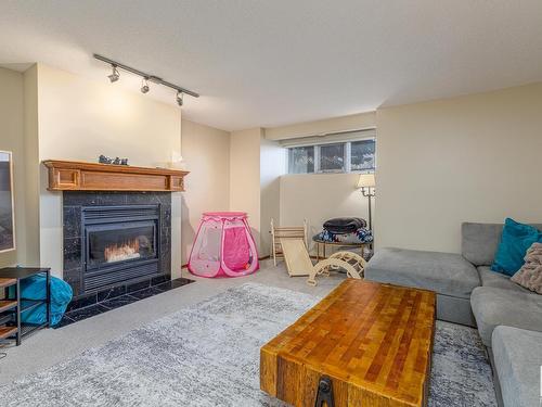 9309 98 Avenue, Edmonton, AB - Indoor Photo Showing Living Room With Fireplace