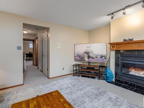 9309 98 Avenue, Edmonton, AB - Indoor Photo Showing Living Room With Fireplace