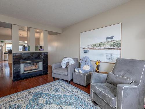 9309 98 Avenue, Edmonton, AB - Indoor Photo Showing Living Room With Fireplace