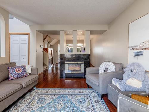 9309 98 Avenue, Edmonton, AB - Indoor Photo Showing Living Room With Fireplace