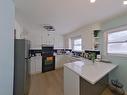 7928 82 Ave, Edmonton, AB  - Indoor Photo Showing Kitchen With Double Sink 