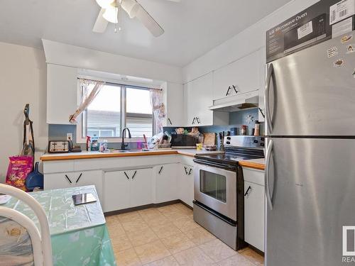 8844 93 Street, Edmonton, AB - Indoor Photo Showing Kitchen With Double Sink