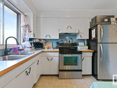 8844 93 Street, Edmonton, AB - Indoor Photo Showing Kitchen With Double Sink