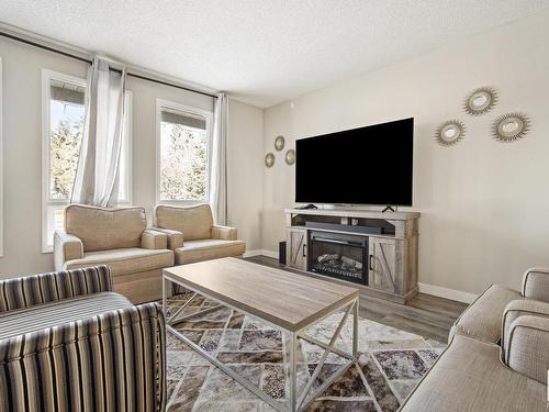 72 Howson Crescent, Edmonton, AB - Indoor Photo Showing Living Room With Fireplace