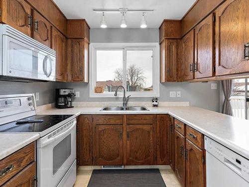 3512 12A Avenue Nw, Edmonton, AB - Indoor Photo Showing Kitchen With Double Sink