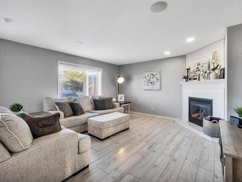 1222 Mcallister Way, Edmonton, AB - Indoor Photo Showing Living Room With Fireplace