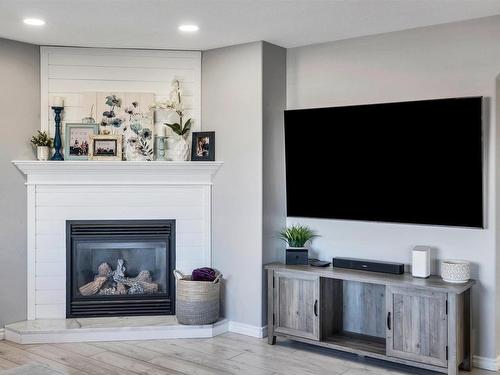 1222 Mcallister Way, Edmonton, AB - Indoor Photo Showing Living Room With Fireplace