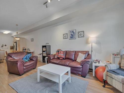 310 10411 122 Street, Edmonton, AB - Indoor Photo Showing Living Room