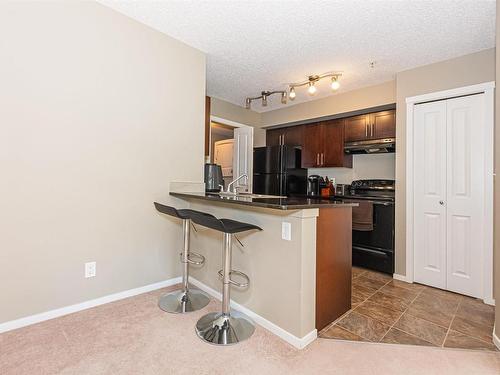 215 5816 Mullen Place, Edmonton, AB - Indoor Photo Showing Kitchen