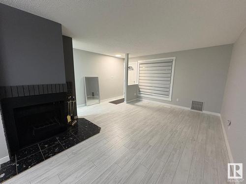 29 2204 118 Street, Edmonton, AB - Indoor Photo Showing Living Room With Fireplace