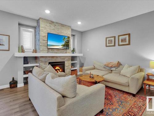 16787 36 Street, Edmonton, AB - Indoor Photo Showing Living Room With Fireplace