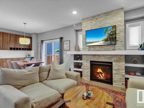 16787 36 Street, Edmonton, AB - Indoor Photo Showing Living Room With Fireplace