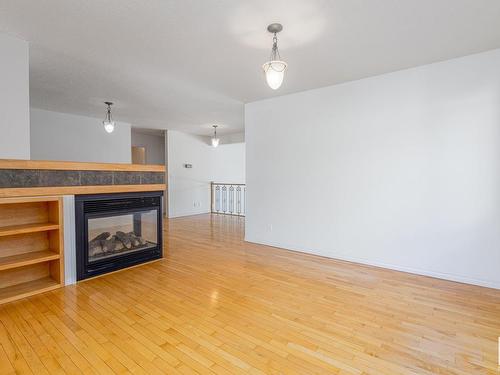 9216 86 Street, Edmonton, AB - Indoor Photo Showing Living Room With Fireplace