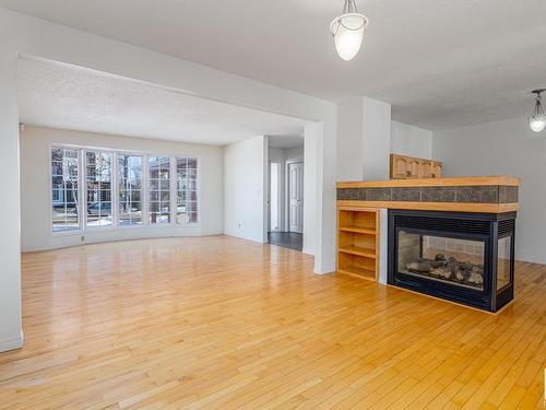 9216 86 Street, Edmonton, AB - Indoor Photo Showing Living Room With Fireplace