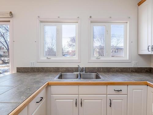 9216 86 Street, Edmonton, AB - Indoor Photo Showing Kitchen With Double Sink