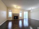 21308 45A Avenue, Edmonton, AB  - Indoor Photo Showing Living Room With Fireplace 