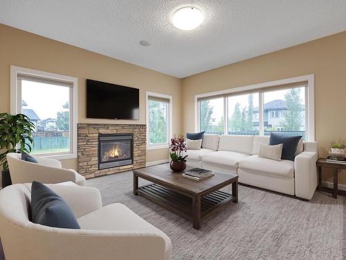 770 Lewis Greens Drive, Edmonton, AB - Indoor Photo Showing Living Room With Fireplace