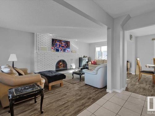 9823 156 Avenue, Edmonton, AB - Indoor Photo Showing Living Room With Fireplace