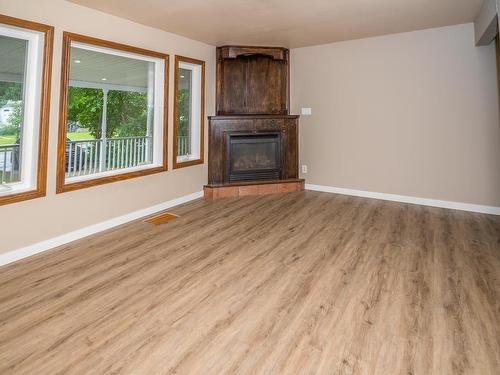 10819 138 Street, Edmonton, AB - Indoor Photo Showing Living Room With Fireplace