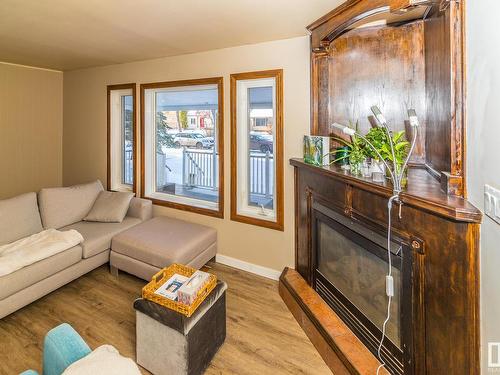 10819 138 Street, Edmonton, AB - Indoor Photo Showing Living Room With Fireplace