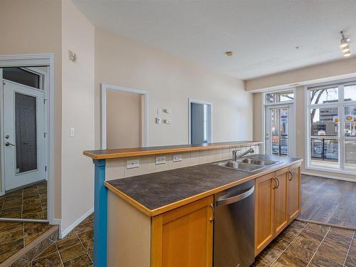 143 10403 122 Street, Edmonton, AB - Indoor Photo Showing Kitchen With Double Sink