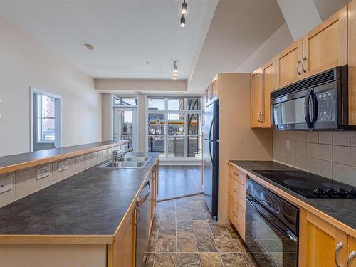 143 10403 122 Street, Edmonton, AB - Indoor Photo Showing Kitchen With Double Sink