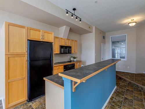 143 10403 122 Street, Edmonton, AB - Indoor Photo Showing Kitchen With Double Sink