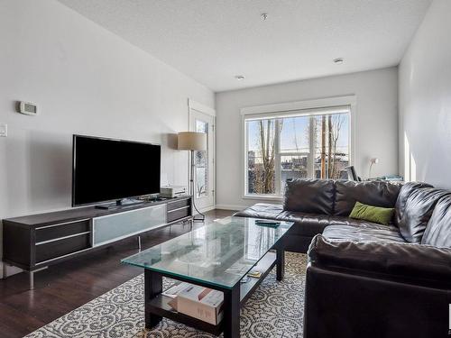 209 10518 113 Street, Edmonton, AB - Indoor Photo Showing Living Room