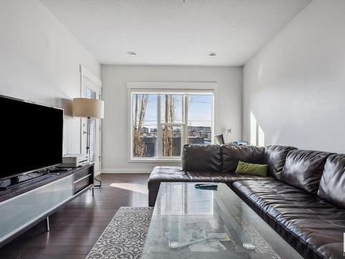 209 10518 113 Street, Edmonton, AB - Indoor Photo Showing Living Room