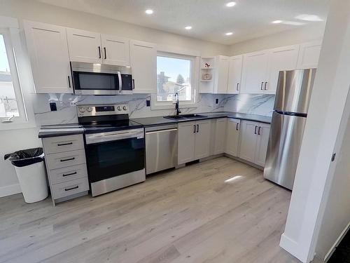 15310 121 Street, Edmonton, AB - Indoor Photo Showing Kitchen With Double Sink