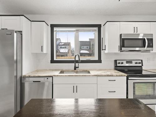 2432 117 Street, Edmonton, AB - Indoor Photo Showing Kitchen With Stainless Steel Kitchen With Double Sink With Upgraded Kitchen