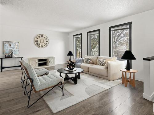 2432 117 Street, Edmonton, AB - Indoor Photo Showing Living Room With Fireplace