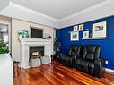 4340 28A Street, Edmonton, AB  - Indoor Photo Showing Living Room With Fireplace 