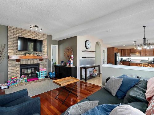 4340 28A Street, Edmonton, AB - Indoor Photo Showing Living Room With Fireplace