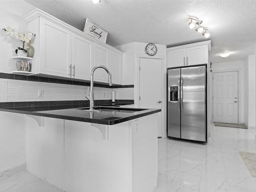 1947 51 Street, Edmonton, AB - Indoor Photo Showing Kitchen