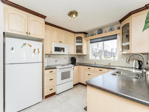 10616 145 Street, Edmonton, AB - Indoor Photo Showing Kitchen With Double Sink