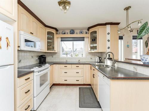 10616 145 Street, Edmonton, AB - Indoor Photo Showing Kitchen With Double Sink