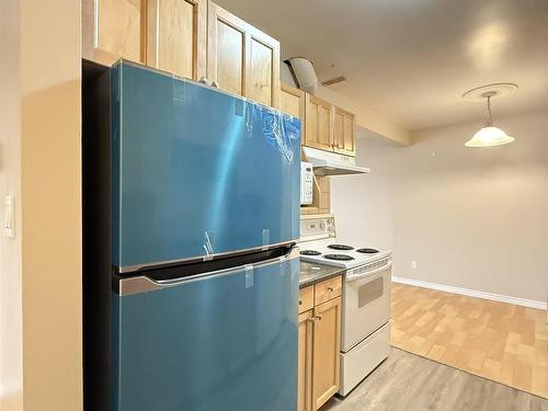 56 11265 31 Avenue, Edmonton, AB - Indoor Photo Showing Kitchen