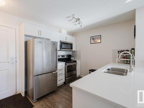 327 1820 Rutherford Road, Edmonton, AB - Indoor Photo Showing Kitchen With Double Sink