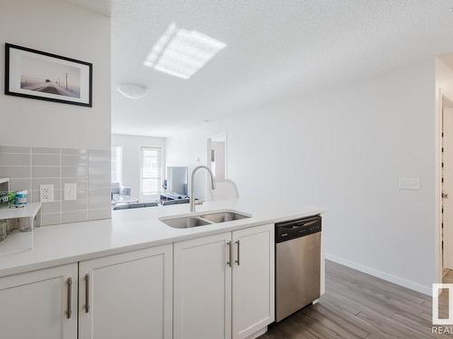 327 1820 Rutherford Road, Edmonton, AB - Indoor Photo Showing Kitchen With Double Sink