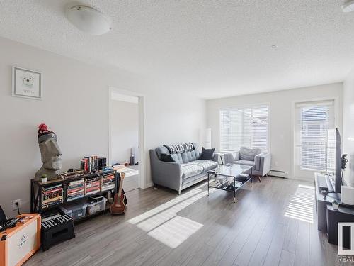 327 1820 Rutherford Road, Edmonton, AB - Indoor Photo Showing Living Room